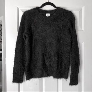 A new day fuzzy sweater